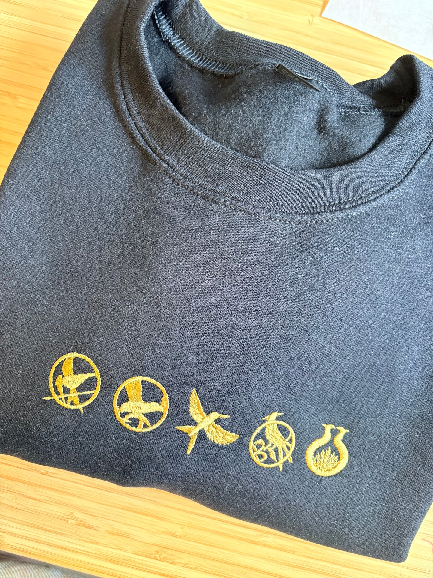 Hunger game symbols embroidery